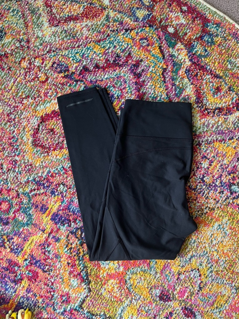 Athleta black high rise leggings with reflective strip size medium